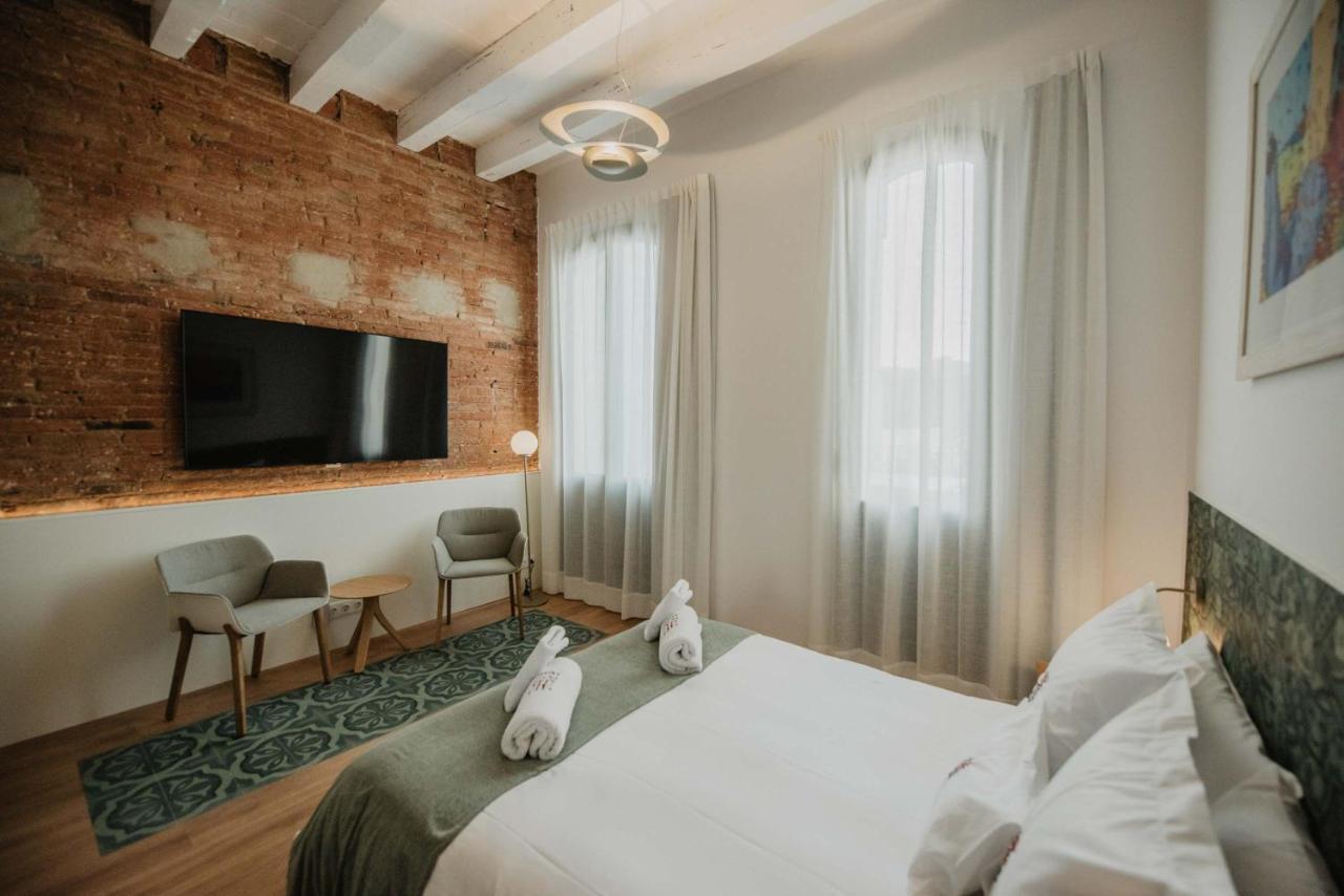 Petit Luxe Volta Bed & Breakfast Terrassa Bagian luar foto