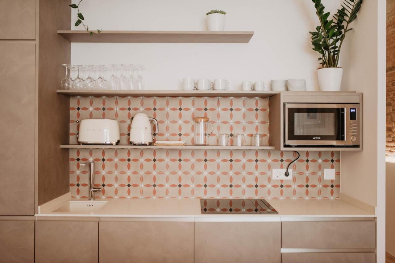 Petit Luxe Volta Bed & Breakfast Terrassa Bagian luar foto
